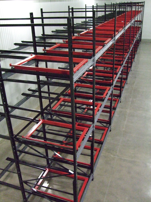 Installed push back pallet rack system